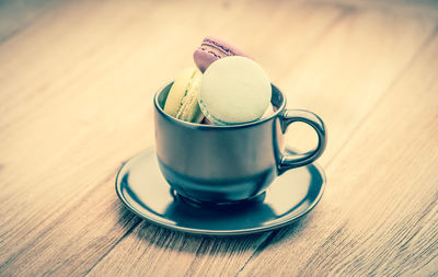 Close-up of coffee cup on table