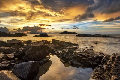 Scenic view of sea against sky during sunset