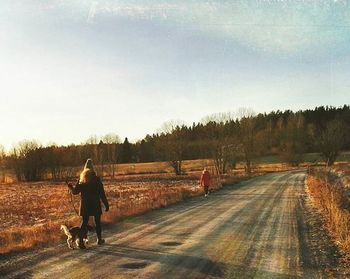 Road passing through field