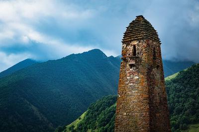 View of historic building against cloudy sky