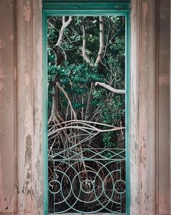 Damaged window of old abandoned building