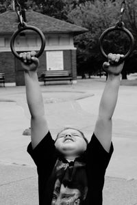 Cute boy exercising outdoors