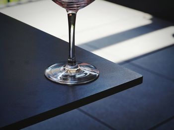 High angle view of wineglass on table