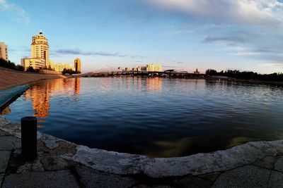 River in city against sky