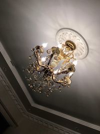 Low angle view of illuminated chandelier