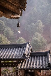 Low angle view of roof against sky