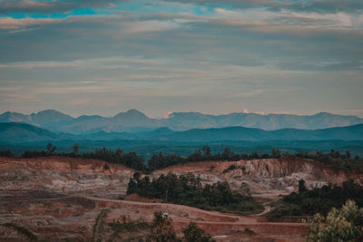 Scenic view of landscape against sky during sunset