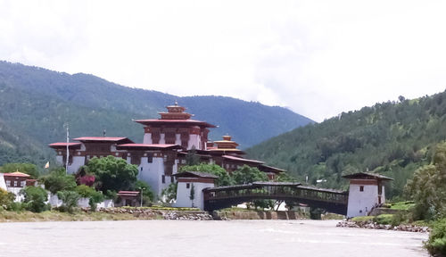 View of building with mountain range in background