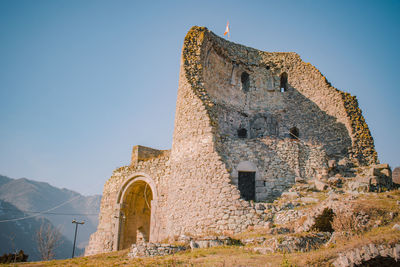 Low angle view of historic building against sky