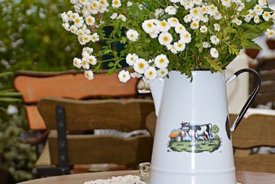 Close-up of flowers in vase on table