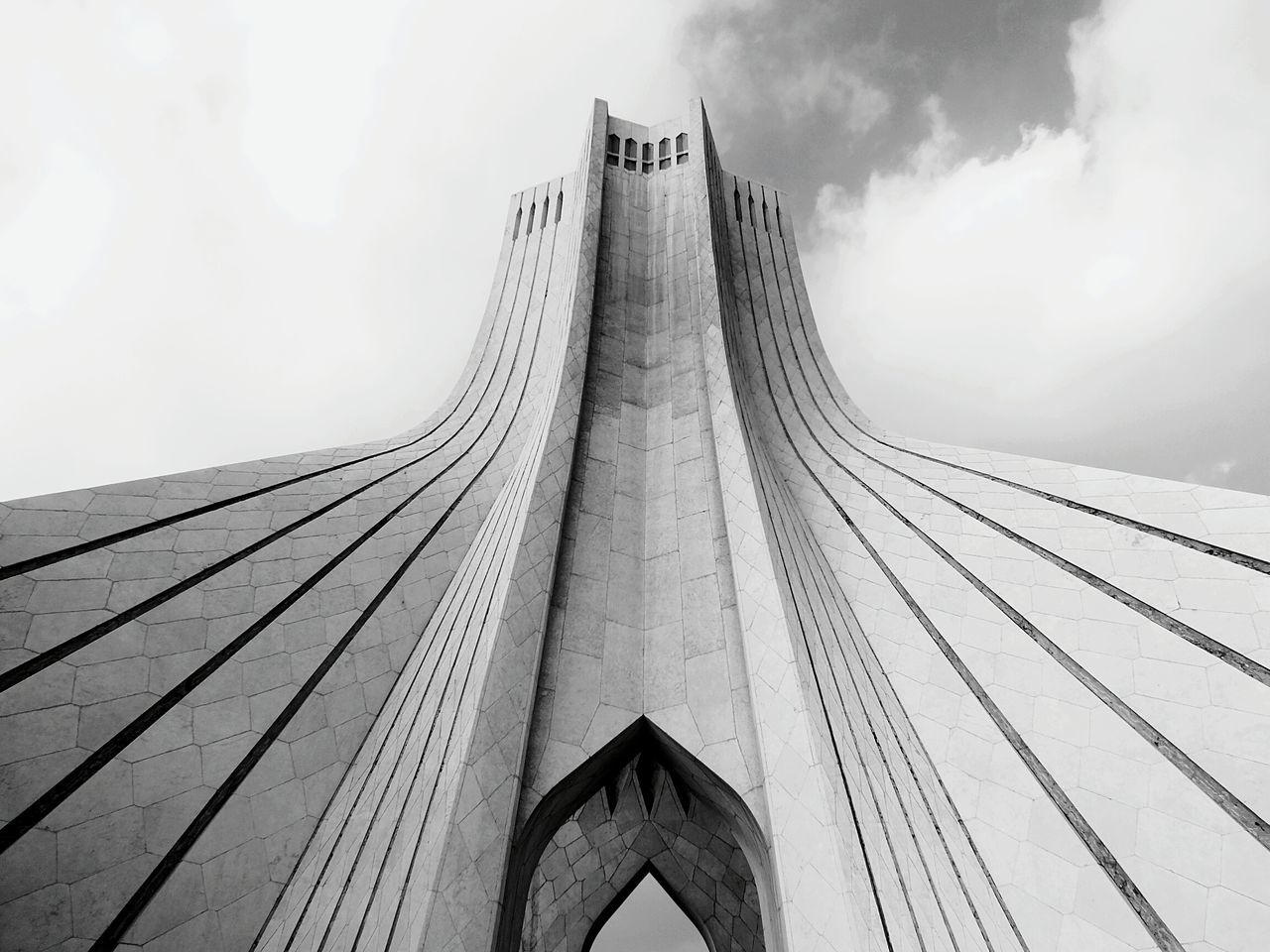 architecture, built structure, low angle view, building exterior, sky, tall - high, modern, tower, skyscraper, cloud - sky, day, city, no people, cloud, outdoors, diminishing perspective, architectural feature, office building, building, famous place