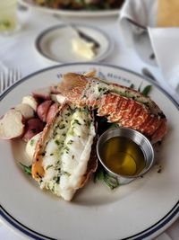 Two plump, buttery lobster tails, perfectly grilled and tantalizingly delicious.