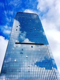 Low angle view of skyscraper against sky