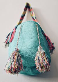 Close-up of bag hanging against wall