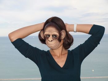Portrait of woman against sky