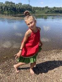 Full length of woman on shore at beach