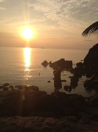 Scenic view of sea at sunset