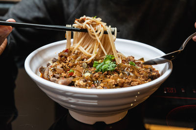 Close-up of noodle in bowl on table