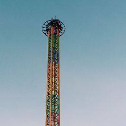 Low angle view of tower against clear blue sky
