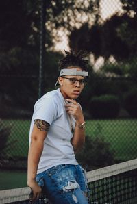 Young man looking away outdoors