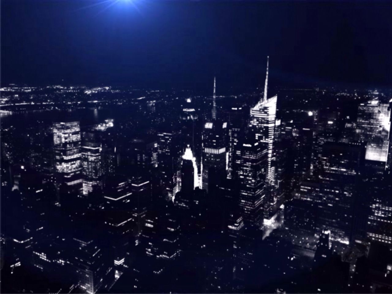 High angle view of illuminated buildings during night