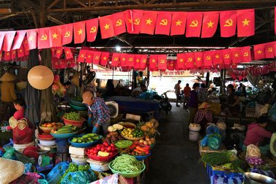 People at market stall