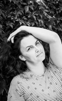 Portrait of young woman looking away