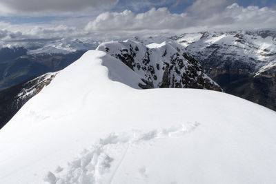 Scenic view of snow covered mountains