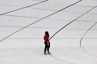 High angle view of woman standing on floor