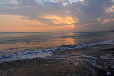 Scenic view of sea against sky during sunset