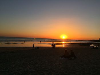 Scenic view of sea at sunset