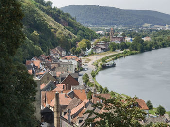 High angle view of townscape by river