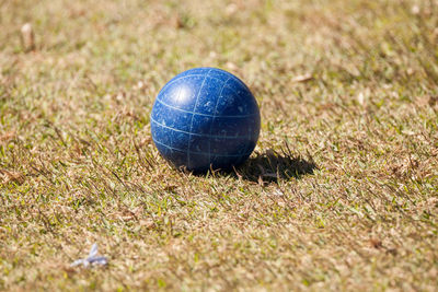 Bocce ball on the green grass of an open field ready for sport in naples, florida