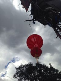 Low angle view of silhouette branches against sky