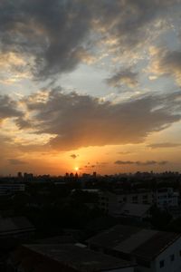 High angle view of city at sunset