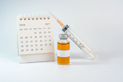 Close-up of bottle against white background