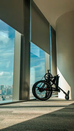 Bicycles against an office window