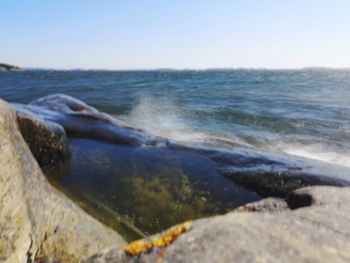 Scenic view of sea against clear sky