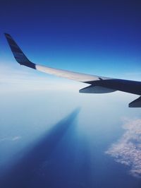 Cropped image of airplane wing