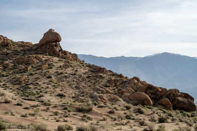 Scenic view of rocky mountains against sky