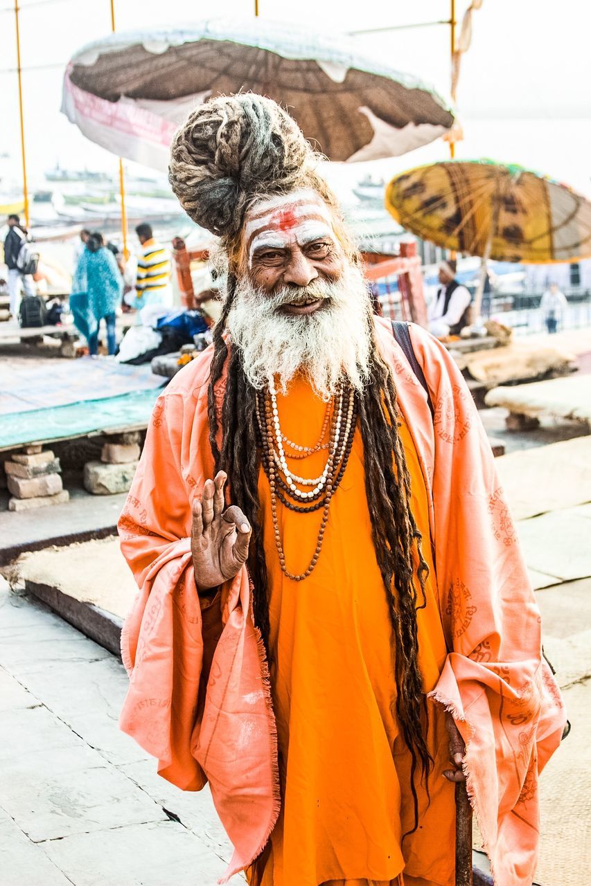 one person, beard, facial hair, clothing, front view, real people, portrait, senior adult, lifestyles, traditional clothing, adult, looking at camera, waist up, focus on foreground, men, incidental people, outdoors, social issues