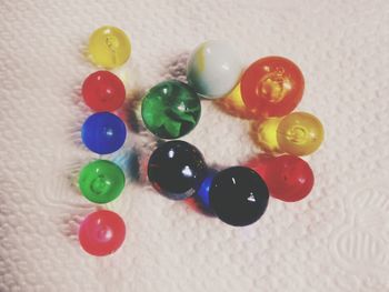 High angle view of multi colored balls on table