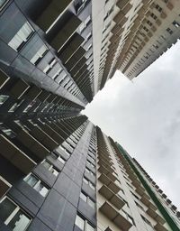 Low angle view of modern buildings against sky