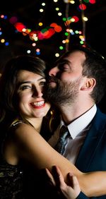 Portrait of smiling young couple