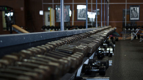 Close-up of dumbbells in gym