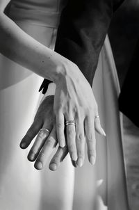 Close-up of couple holding hands