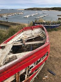 High angle view of abandoned boat moored on beach