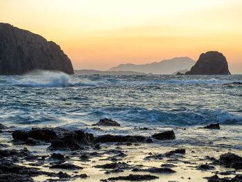 Scenic view of sea against sky during sunset