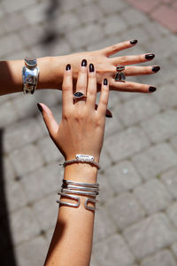 Cropped hand of woman holding cigarette