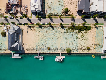 High angle view of swimming pool by building